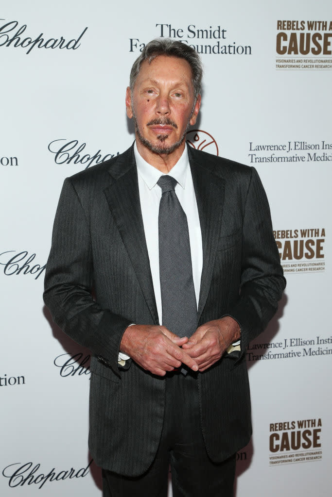 Close-up of Larry in a suit and tie at a media event