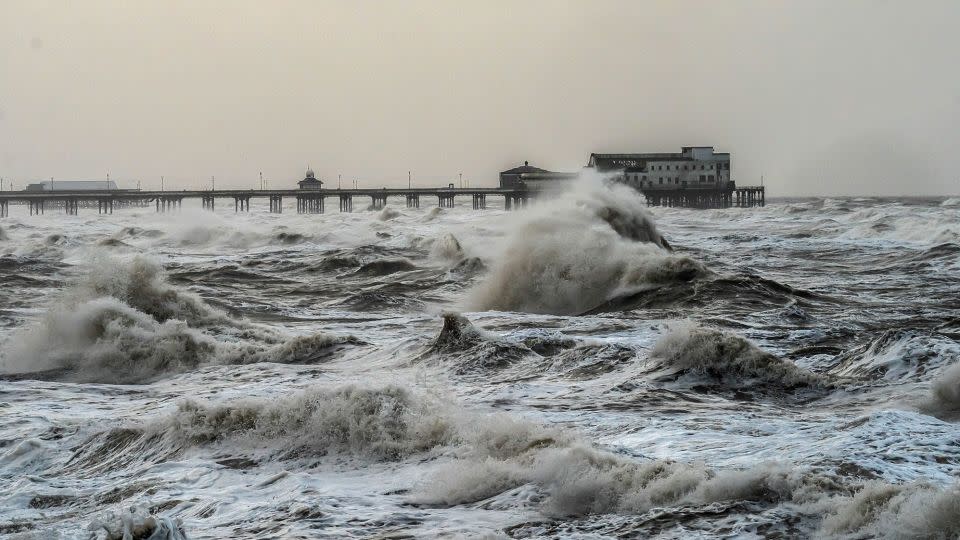 Waves break on the sea front in Blackpool, England, January 22, 2024. - Danny Lawson/PA Images/Getty Images