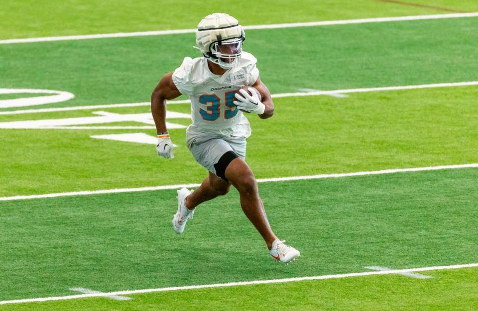 Miami Dolphins running back Chris Brooks (35) runs with the ball during team practice at the Baptist Health Training Complex on Wednesday, Sept. 6, 2023 in Miami Gardens, Fla.