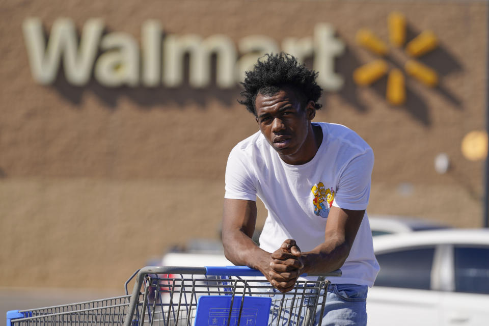 Bryant West, who has a job at a Walmart, poses for a portrait in Pascagoula, Miss., Friday, Oct. 20, 2023. Girls consistently are outperforming boys, graduating at higher rates at public high schools around the country. Students, educators and researchers say there are several reasons why boys are falling short.(AP Photo/Gerald Herbert)