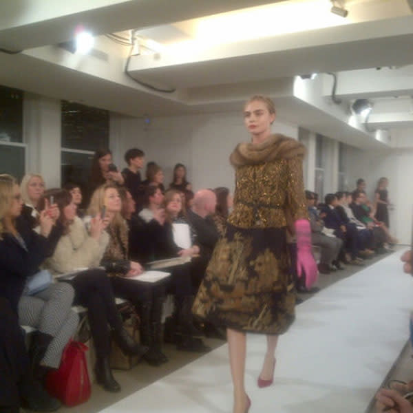 British Vogue tweeted a runway pic of Cara Delevingne on the Oscar de la Renta catwalk.