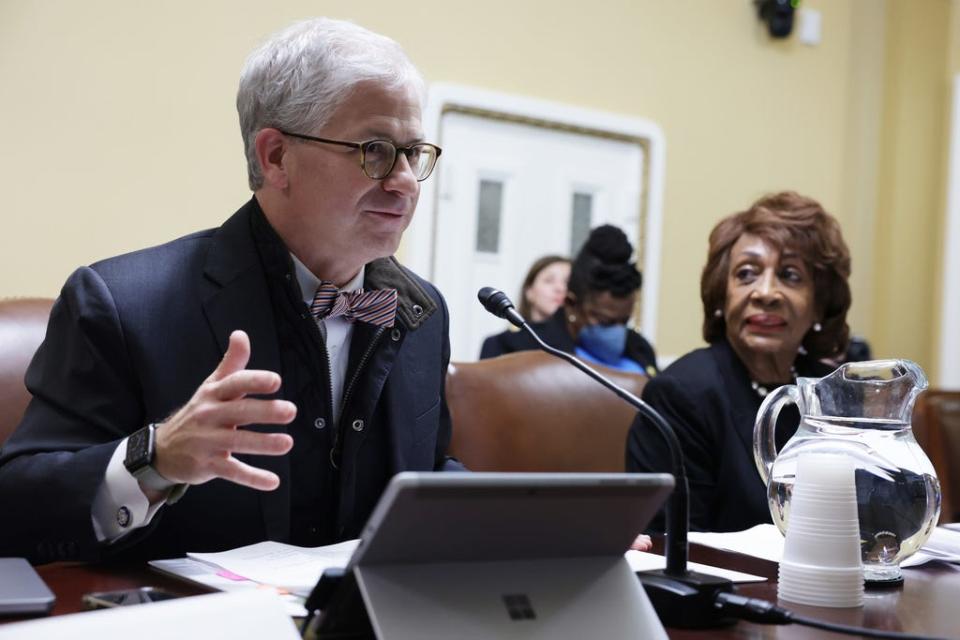 U.S. Rep. Patrick McHenry, R-N.C., (L) speaks as Rep. Maxine Waters, D-Calif., (R) listens during a hearing before the House Committee on Rules January 31, 2023 in Washington, DC.