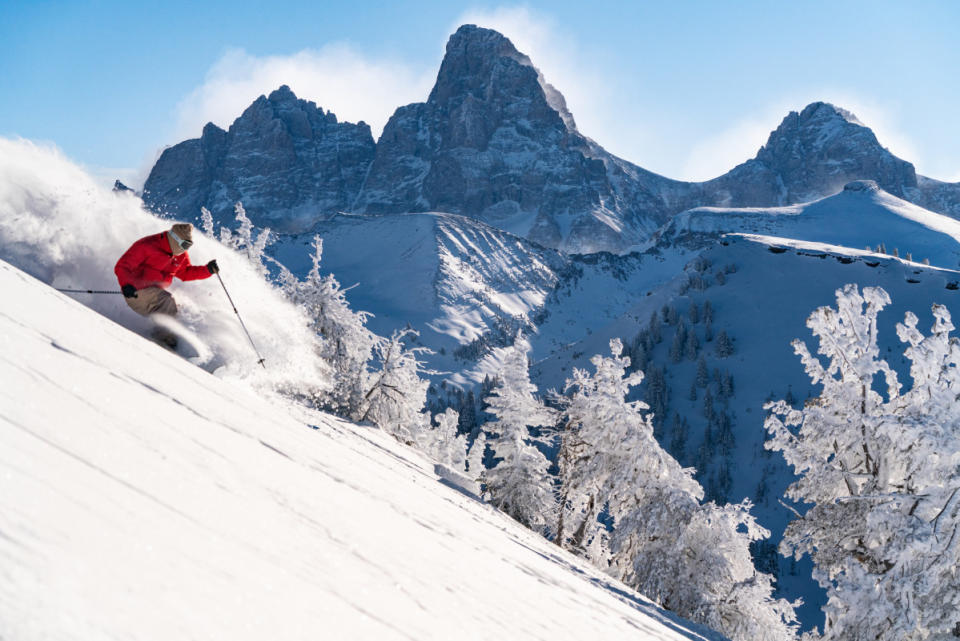 Skier Sam Winship with The Grand Tetons looming large overhead. Photo from '23/'24 season.<p><a href="https://www.instagram.com/samnegen/" rel="nofollow noopener" target="_blank" data-ylk="slk:Photo: Sam Negen;elm:context_link;itc:0;sec:content-canvas" class="link ">Photo: Sam Negen</a></p>