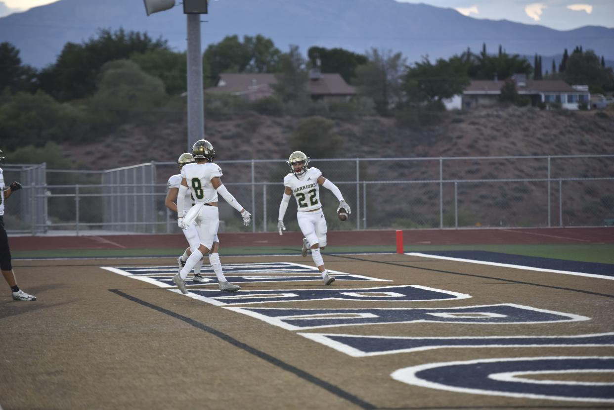 Brooks Esplin and his Warriors teammates celebrate during a recent scrimmage at Snow Canyon High School. The Warriors were one of several Region 10 teams who started the season Friday with impressive wins.