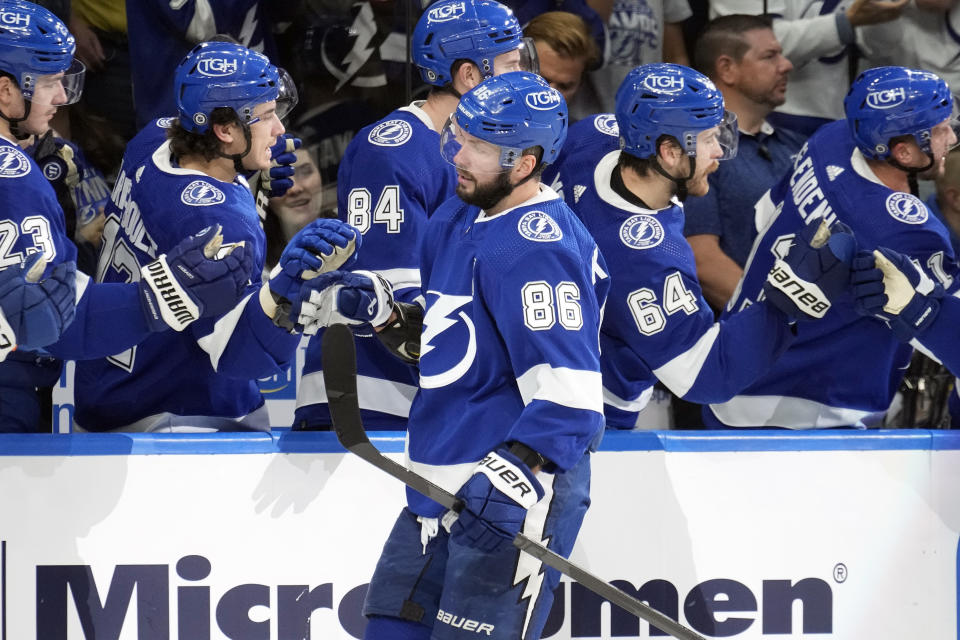 Tampa Bay Lightning right wing Nikita Kucherov (86) celebrates his goal against the Edmonton Oilers during the first period of an NHL hockey game Saturday, Nov. 18, 2023, in Tampa, Fla. (AP Photo/Chris O'Meara)