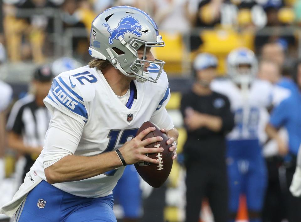 Detroit Lions quarterback Tim Boyle (12) scrambles with the ball against the Pittsburgh Steelers during the first quarter at Heinz Field on August 21, 2021.