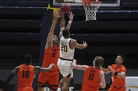 California forward Matt Bradley shoots over Oregon State center Roman Silva during the first half of an NCAA college basketball game in Berkeley, Calif., Thursday, Feb. 25, 2021. (AP Photo/Jed Jacobsohn)