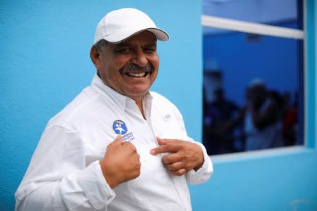 Otoniel Lima, mayor of La Nueva Concepcion, poses for a photo after an interview with Reuters at the municipality of La Nueva Concepcion