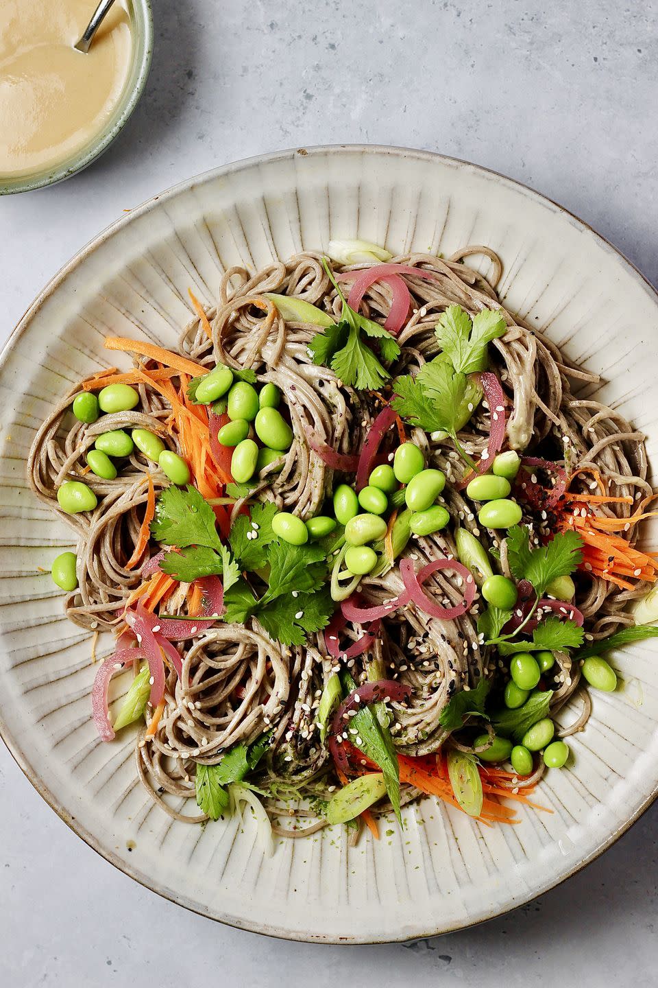 <p>Fill up with seasonal veggies and tuck in to this Sesame Soba Noodle Salad - the <a href="https://www.delish.com/uk/cooking/a42356295/tahini/" rel="nofollow noopener" target="_blank" data-ylk="slk:tahini;elm:context_link;itc:0;sec:content-canvas" class="link ">tahini</a> sesame dressing is a must.</p><p>Get the <a href="https://www.delish.com/uk/cooking/recipes/a43093266/sesame-soba-noodle-salad/" rel="nofollow noopener" target="_blank" data-ylk="slk:Sesame Soba Noodle Salad;elm:context_link;itc:0;sec:content-canvas" class="link ">Sesame Soba Noodle Salad</a> recipe.</p>