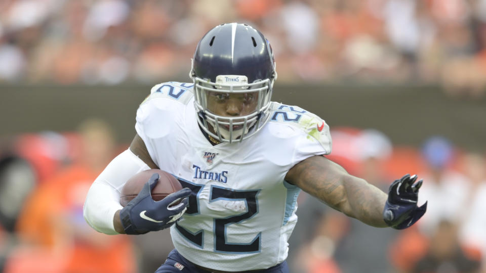 Tennessee Titans running back Derrick Henry (22) still pays attention to the Auburn-Alabama rivalry. (AP Photo/David Richard)