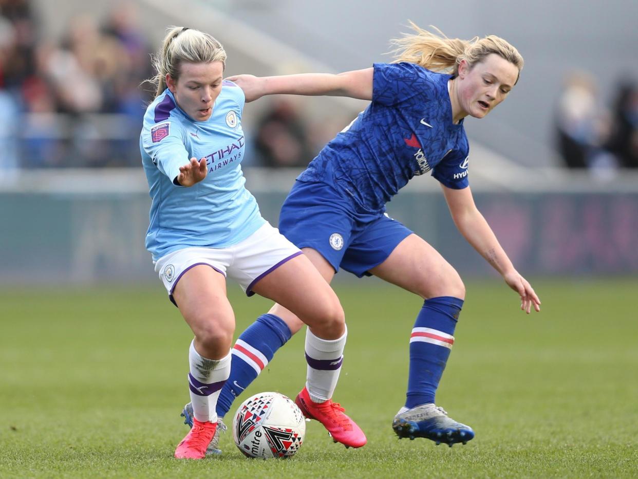 Lauren Hemp of Manchester City and Erin Cuthbert of Chelsea: Getty Images