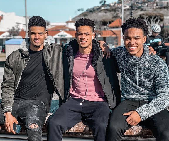 <p>Amron-Ra St. Brown/Instagram</p> Equanimeous St. Brown, Osiris St. Brown and Amon-Ra St. Brown pose for a photo outdoors.