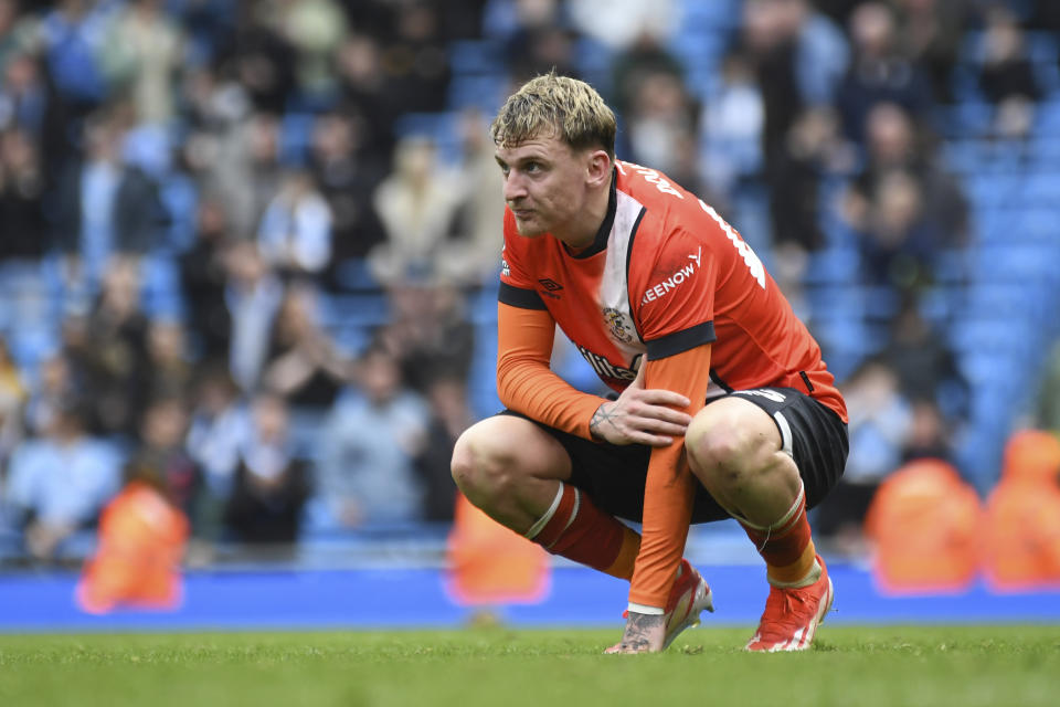 Luton Town's Mads Andersen reacts disappointed after the English Premier League soccer match between Manchester City and Luton Town at Etihad stadium in Manchester, England, Saturday, April 13, 2024. (AP Photo/Rui Vieira)