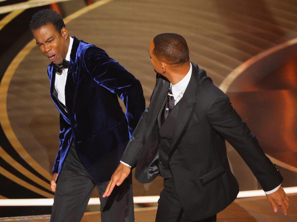 Will Smith hits Chris Rock at the 2022 Oscars