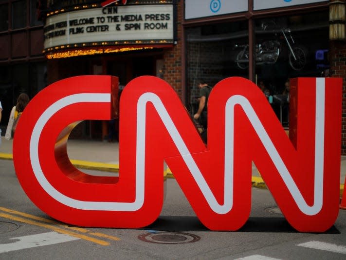 FILE PHOTO: The CNN logo stands outside the venue of the second Democratic 2020 U.S. presidential candidates debate, in the Fox Theater in Detroit, Michigan, U.S., July 30, 2019.    REUTERS/Brian Snyder