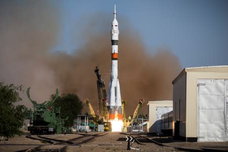 Russian Soyuz-2.1a booster with the Soyuz MS-14 spacecraft blasts off at the Baikonur Cosmodrome