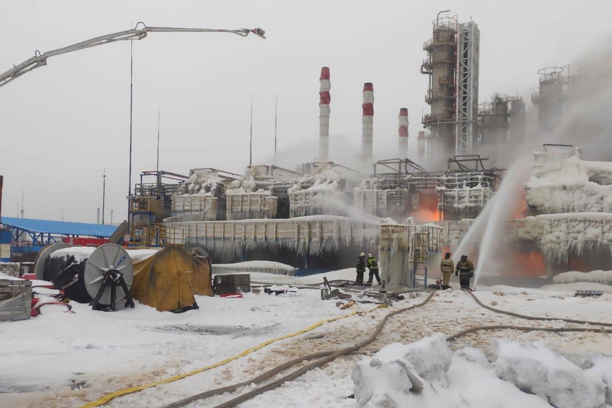In this photo released by Telegram Channel of head of the Kingisepp district administration Yuri Zapalatskiy, fire fighters extinguish the blaze at Russia's second-largest natural gas producer, Novatek in Ust-Luga (AP)