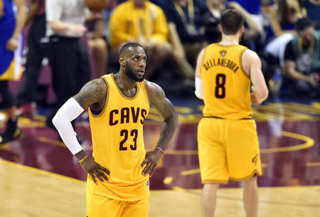 Cleveland Cavaliers forward LeBron James reacts during the third quarter of game four. David Richard-USA TODAY Sports