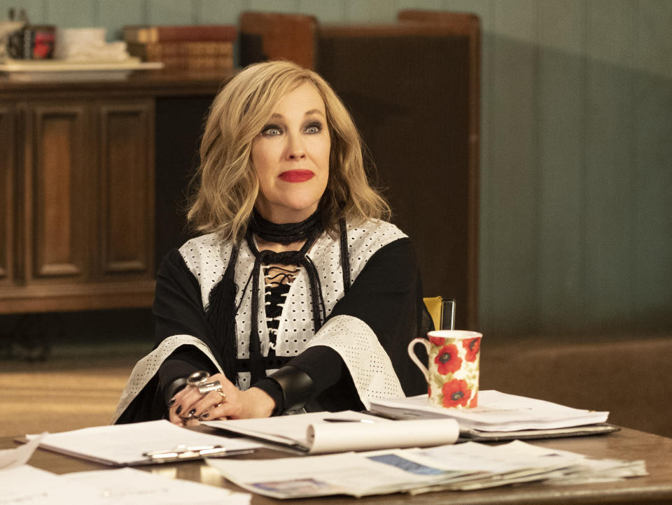 This image released by Pop TV shows Catherine O'Hara in a scene from "Schitt's Creek." O'Hara was nominated for an Emmy Award for outstanding lead actress in a comedy series on Tuesday, July 28, 2020. (Pop TV via AP)