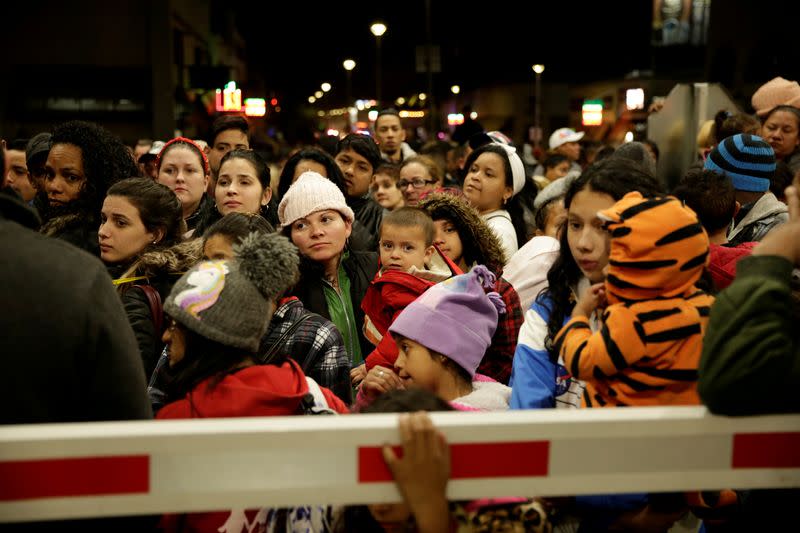 Migrants, mainly from Cuba, block the Paso del Norte border crossing bridge after a U.S. appeals court blocked the Migrant Protection Protocols (MPP) program, in Ciudad Juarez