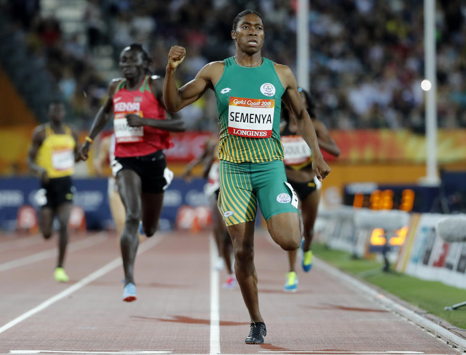 FILE - South Africa's Caster Semenya celebrates after winning the woman's 800m final at Carrara Stadium during the 2018 Commonwealth Games on the Gold Coast, Australia, April 13, 2018. Track and field banned transgender athletes from international competition Thursday, March 23, 2023, while adopting new regulations that could keep Caster Semenya and other athletes with differences in sex development from competing.(AP Photo/Mark Schiefelbein, File)