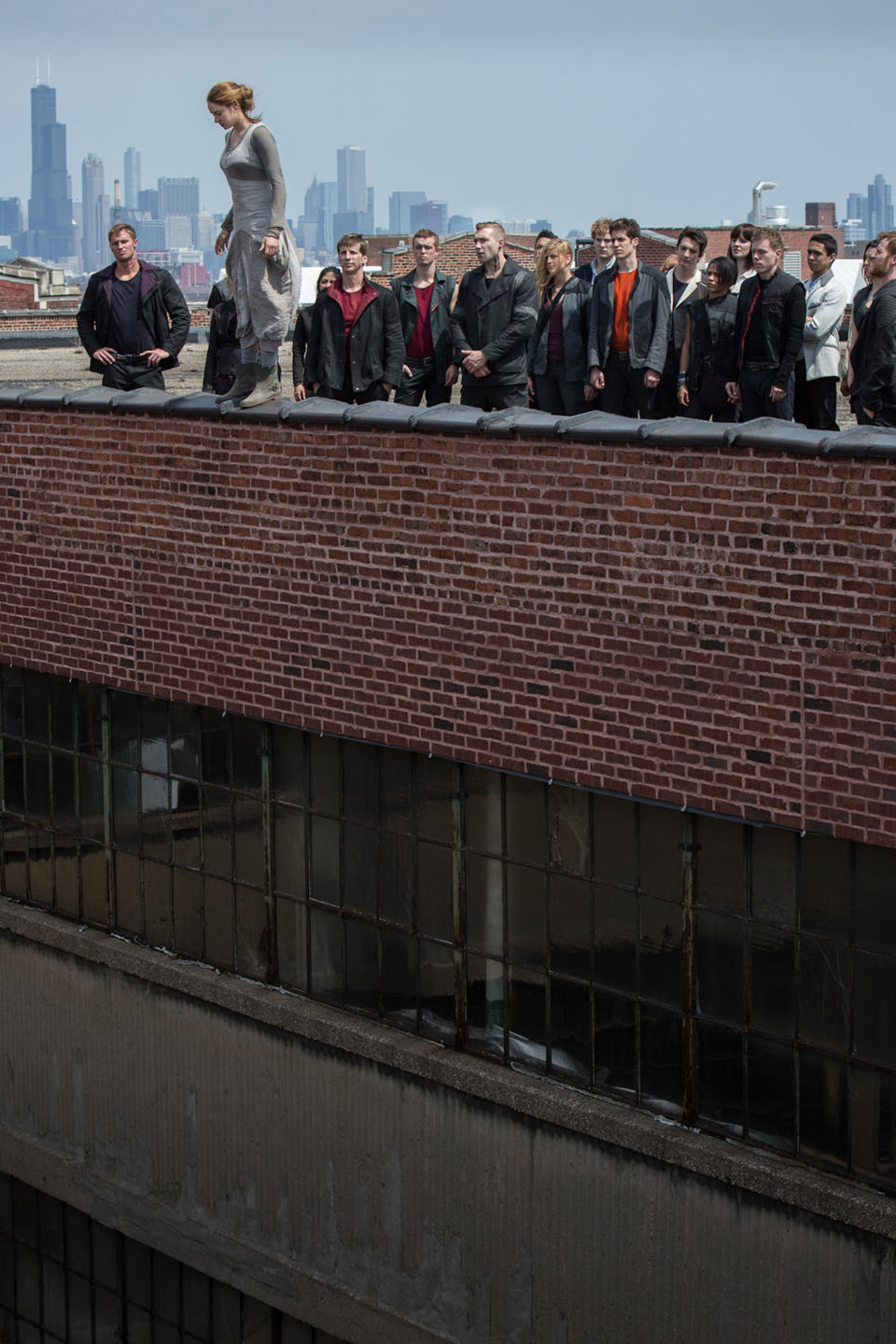 This photo released by Summit Entertainment shows, second left, Shailene Woodley, in the film "Divergent." The movie releases on Friday, March 21, 2014. (AP Photo/Summit Entertainment, Jaap Buitendijk)