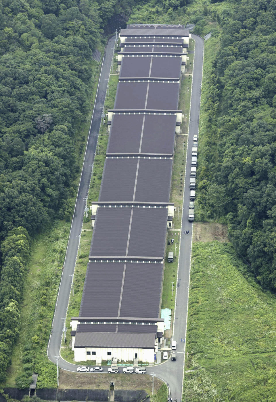 ADDS GROUND SELF DEFENSE FORCE - This aerial photo shows a base firing range of Japan's Ground Self Defense Force in Gifu, central Japan, Wednesday, June 14, 2023, following a deadly shooting. A Japanese soldier was arrested Wednesday after allegedly shooting and wounding three colleagues at the army base, a top government official said. (Kyodo News via AP)