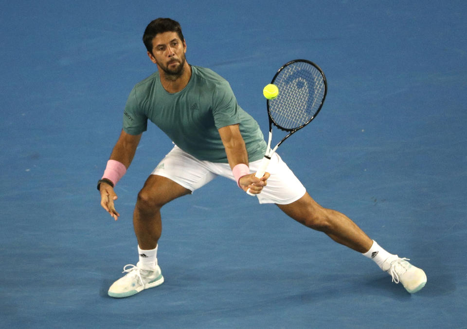 Spain's Fernando Verdasco hits a forehand return Croatia's Marin Cilic during their third round match at the Australian Open tennis championships in Melbourne, Australia, Friday, Jan. 18, 2019. (AP Photo/Mark Schiefelbein)