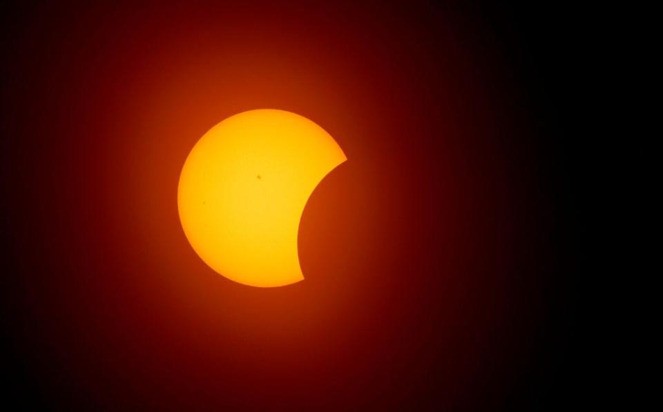 The solar eclipse begins in Fort Worth, Texas