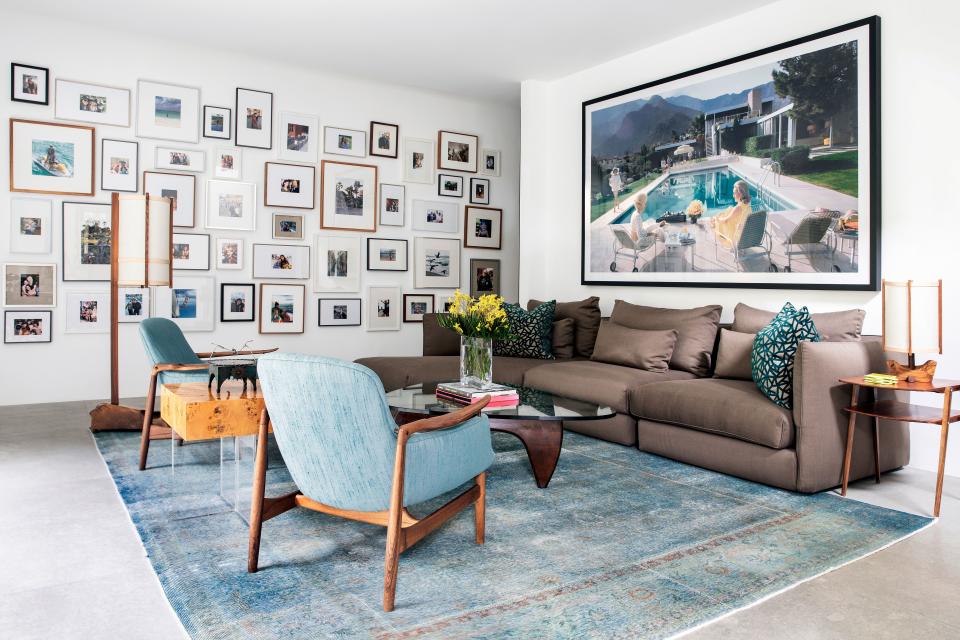 Poolside Gossip by Slim Aarons anchors this sitting room. (“A gift from a friend,” Handler notes.) The walls are filled with photos, mainly of friends and family, largely from travels: “From India to Chile, just all over the world, all my adventures—whether work or personal.” The room features two vintage chairs purchased at auction, as well as an arcade video system that boasts 18 games including Ms. Pac-Man and Donkey Kong. Adds Handler, “My friends’ kids love it. Also, sometimes I will get really stoned and play Super Mario Bros. late at night, so that works out well for everybody.”