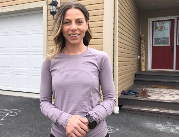 Stephanie Budgell heads out for a run on her lunch break. She's feeling good now, but just finished a year of intense treatments for Stage 4 colorectal cancer.  (Colleen Connors/CBC - image credit)