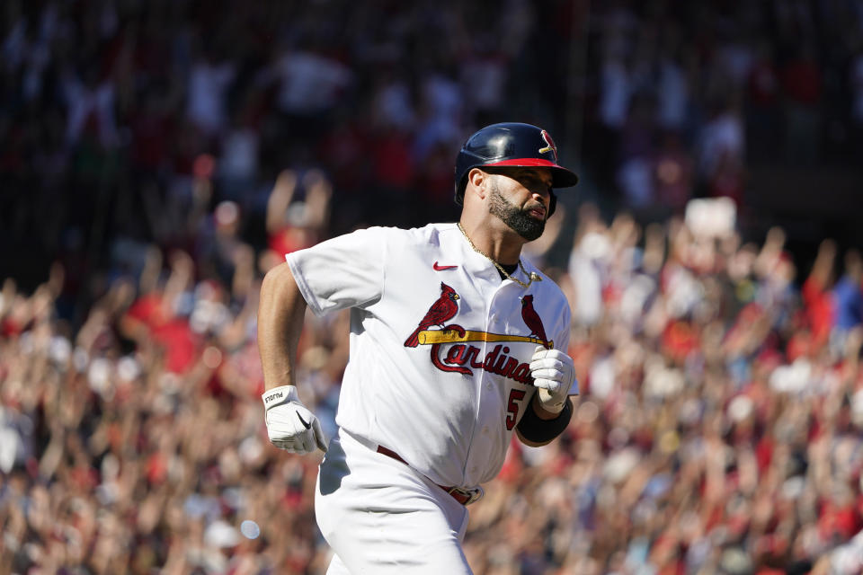 St. Louis Cardinals' Albert Pujols rounds the bases after hitting a solo home run during the third inning of a baseball game against the Pittsburgh Pirates Sunday, Oct. 2, 2022, in St. Louis. (AP Photo/Jeff Roberson)