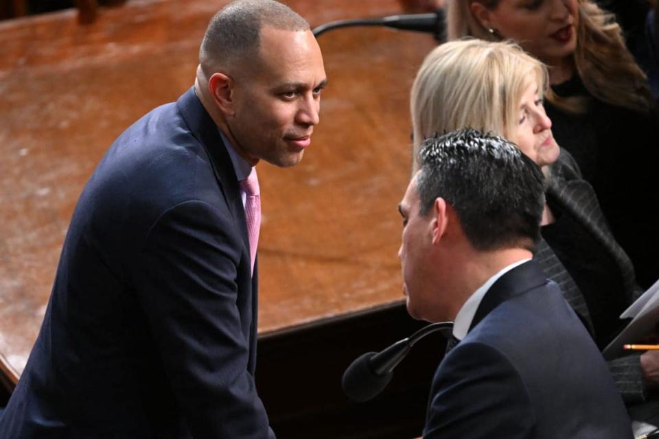 US House Minority Leader Hakeem Jeffries (D-NY) speaks to US Representative Pete Aguilar (D-CA) in the House Chamber of the US Capitol in Washington, DC, on February 7, 2023, ahead of US President Joe Biden’s State of the Union address. (Photo by SAUL LOEB / AFP) (Photo by SAUL LOEB/AFP via Getty Images)