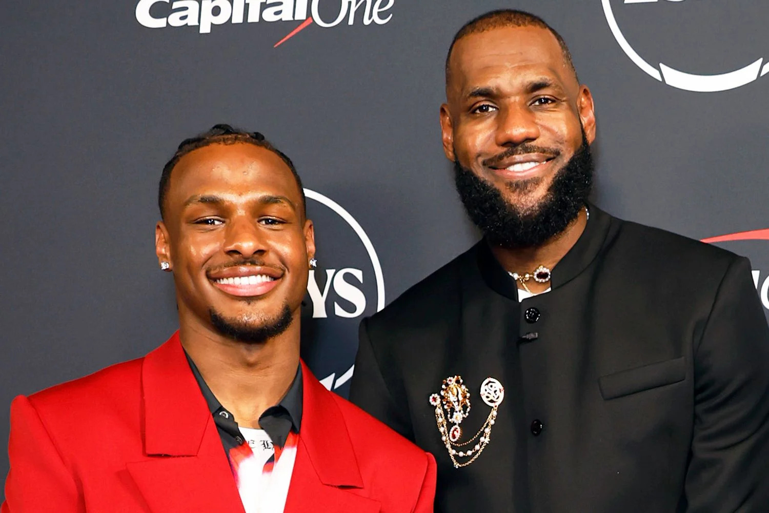 <p>Frazer Harrison/Getty</p> Bronny James and LeBron James attend the 2023 ESPY Awards in Hollywood, California