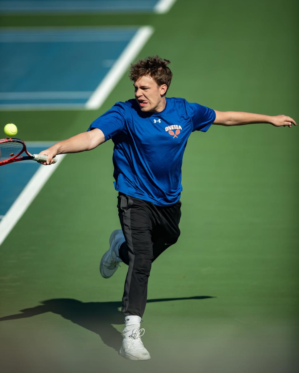 An Oneida player stretches for a backhand during the Section III Class B and C-2 Boys Tennis sectionals at the Parkway Recreation Center in Utica on Wednesday, May 18, 2022.