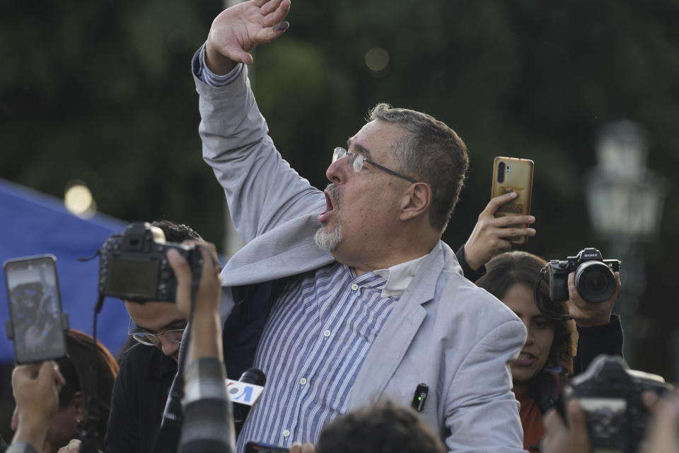 Guatemalan presidential candidate Bernardo Arevalo of the Semilla party celebrates the election results with supporters at Constitution Square in Guatemala City, Monday, June 26, 2023. Arevalo and former first lady Sandra Torres of the UNE party are going to an Aug. 20 presidential runoff. (AP Photo/Moises Castillo)