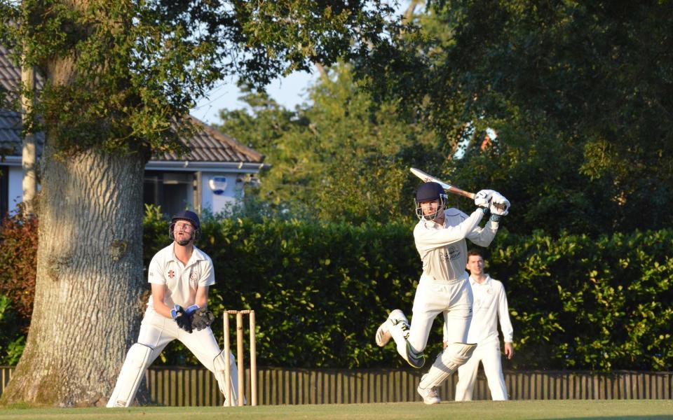 Cricket action at the The Colehill Cricket Club near Wimborne, Dorset. A historic cricket ground is under threat after a complaint from a new neighbour about balls landing in their back garden. The Colehill Cricket Club near Wimborne, Dorset, was first established in 1905 and has been in constant use ever since - StephenNicholls/BNPS