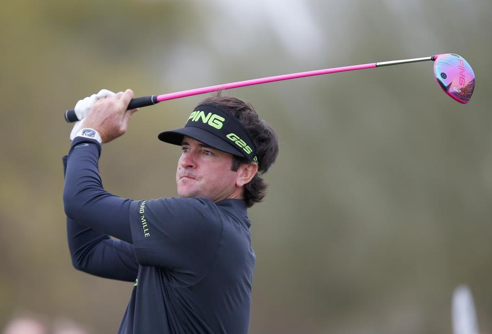 Bubba Watson watches his tee shot on the eighth hole during the second round of the Phoenix Open golf tournament on Friday, Jan. 31, 2014, in Scottsdale, Ariz. (AP Photo/Ross D. Franklin)