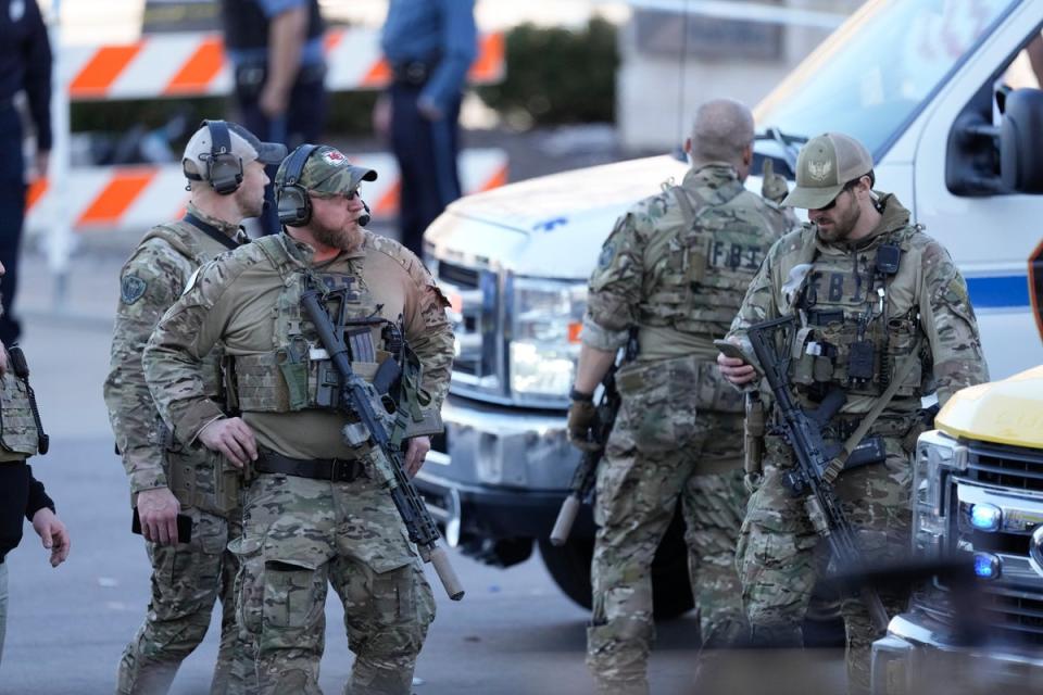 Law enforcement officers following the shooting at the Chiefs victory parade (AP)