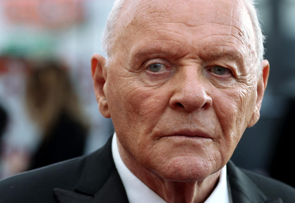 Anthony Hopkins walks the red carpet during the Oscars arrivals at the 94th Academy Awards in Hollywood, Los Angeles, California, U.S., March 27, 2022. REUTERS/Mike Blake
