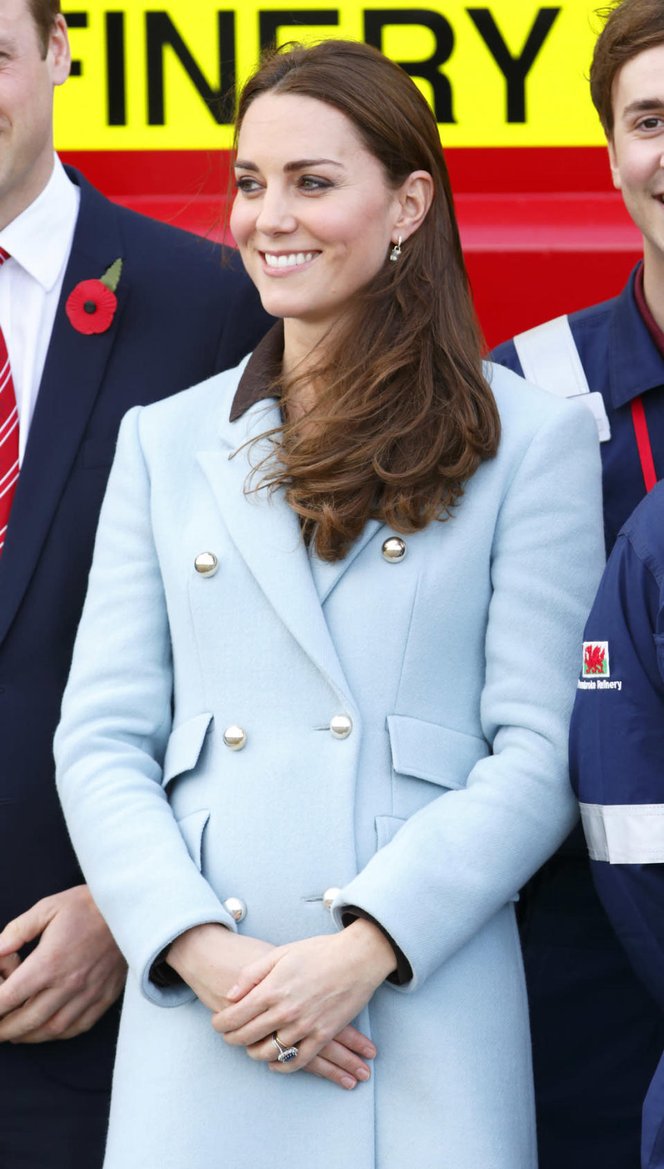 Catherine, Duchess of Cambridge visits Pembroke Refinery in Wales wearing a double-breasted wool coat from Matthew Williamson. It’s currently available for purchase for £1,195.00.