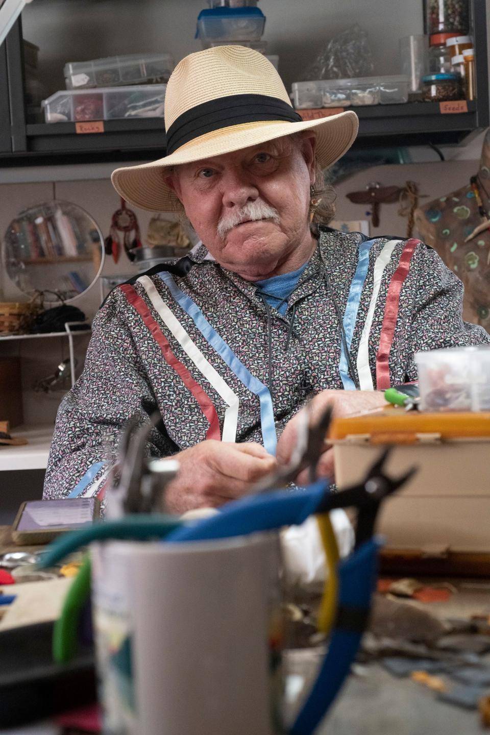 Darrel Roberts, also known as Wind Dancer, creates a piece of tribal jewelry in the crafts room at the  Native Paths Cultural Heritage Resource Center and Museum on Wednesday, Jan. 26, 2023.