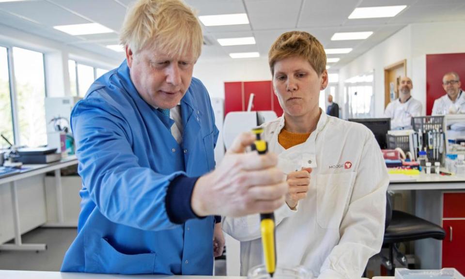 Britain’s Prime Minister Boris Johnson visits to the Mologic Laboratory in the Bedford technology Park, north of London.