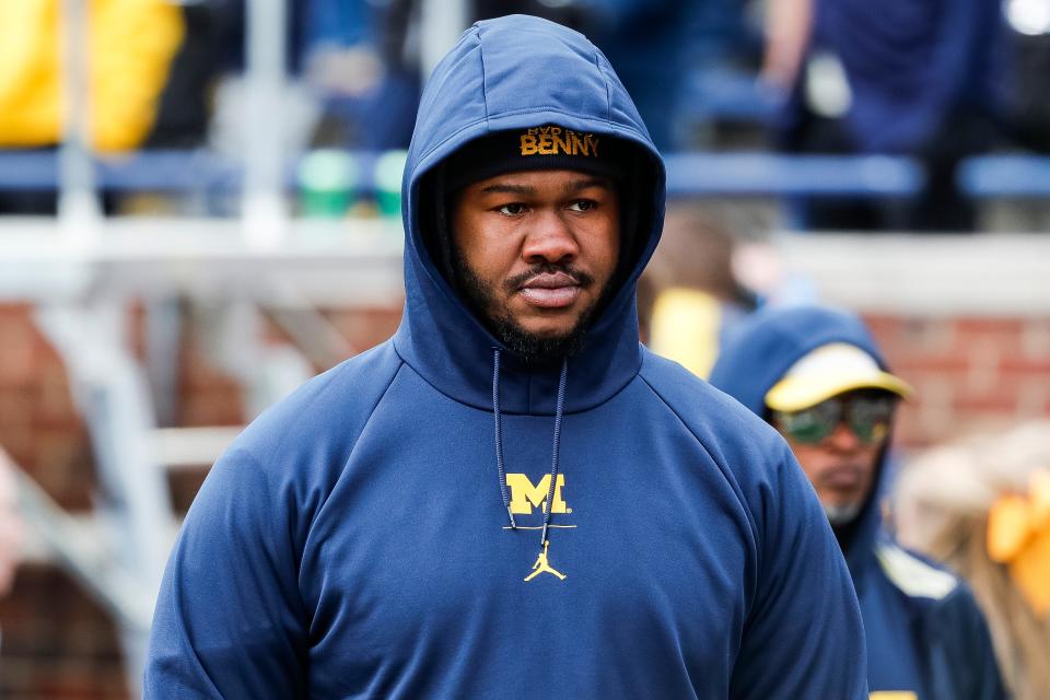 Michigan defensive lineman Rayshaun Benny (26) watches warmup during the spring game at Michigan Stadium in Ann Arbor on Saturday, April 20, 2024.