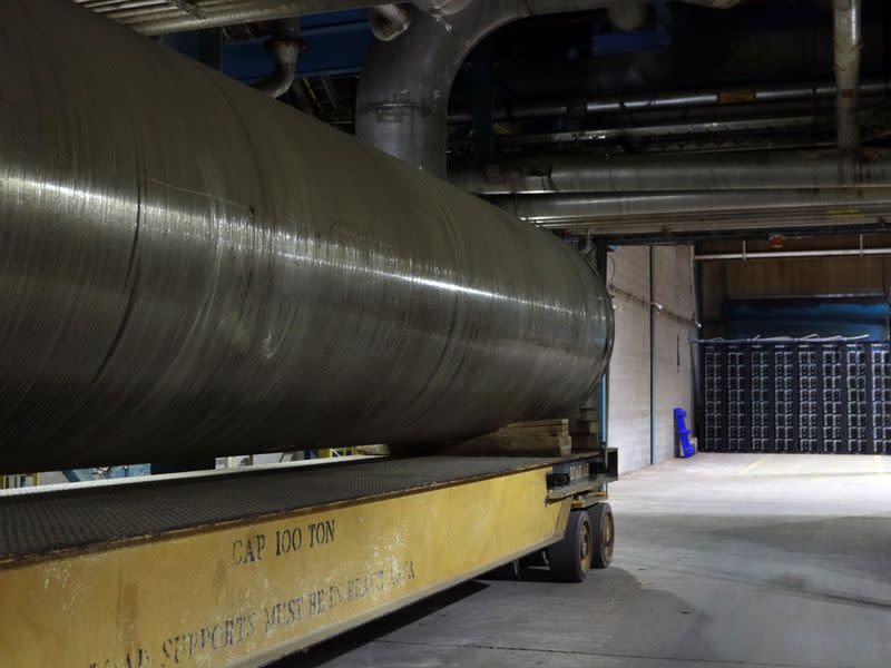 Mining rigs are running next to a 100-ton paper roller at Merkle Standard's site in Washington state, U.S. (Eliza Gkritsi/CoinDesk)