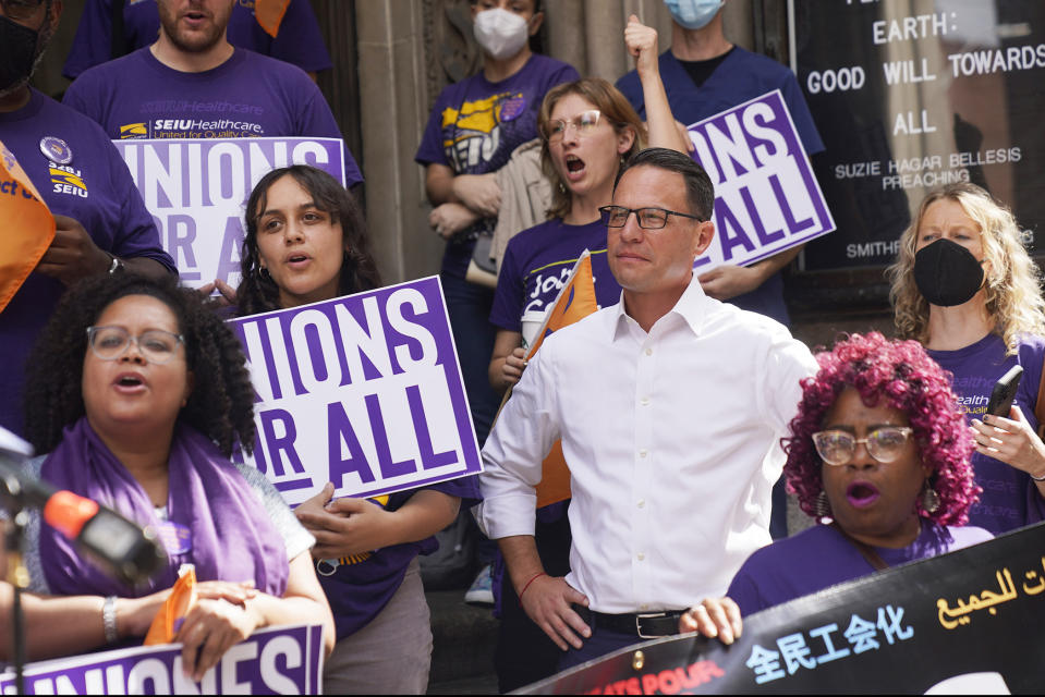 FILE - Pennsylvania candidate for governor, state Attorney General Josh Shapiro, attends a rally of UPMC and Starbucks workers fighting for their union, in Pittsburgh, Monday, Sept. 19, 2022. Shapiro will be taking office as Pennsylvania's next governor in January 2023 after running a campaign in which he spoke early and often about his Jewish religious heritage. (AP Photo/Gene J. Puskar, File)