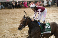 Brian Hernandez Jr. rides Thorpedo Anna to win he 150th running of Kentucky Oaks horse race at Churchill Downs Friday, May 3, 2024, in Louisville, Ky. (AP Photo/Jeff Roberson)