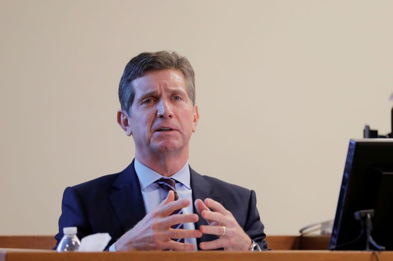 FILE PHOTO: Alex Gorsky, chairman and CEO of Johnson & Johnson, takes the stand in New Jersey Supreme Court in New Brunswick, New Jersey