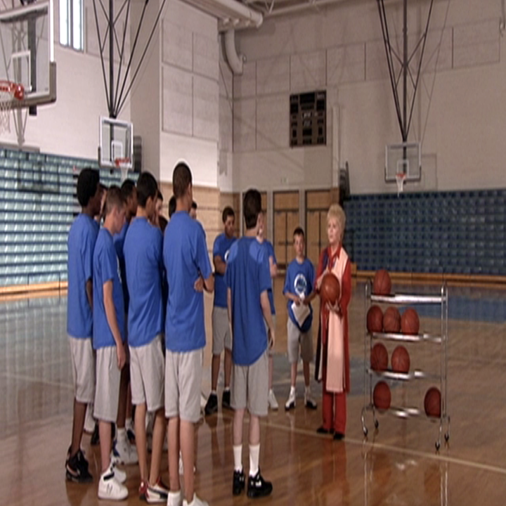 inside the gym where teens are ready to play basketball