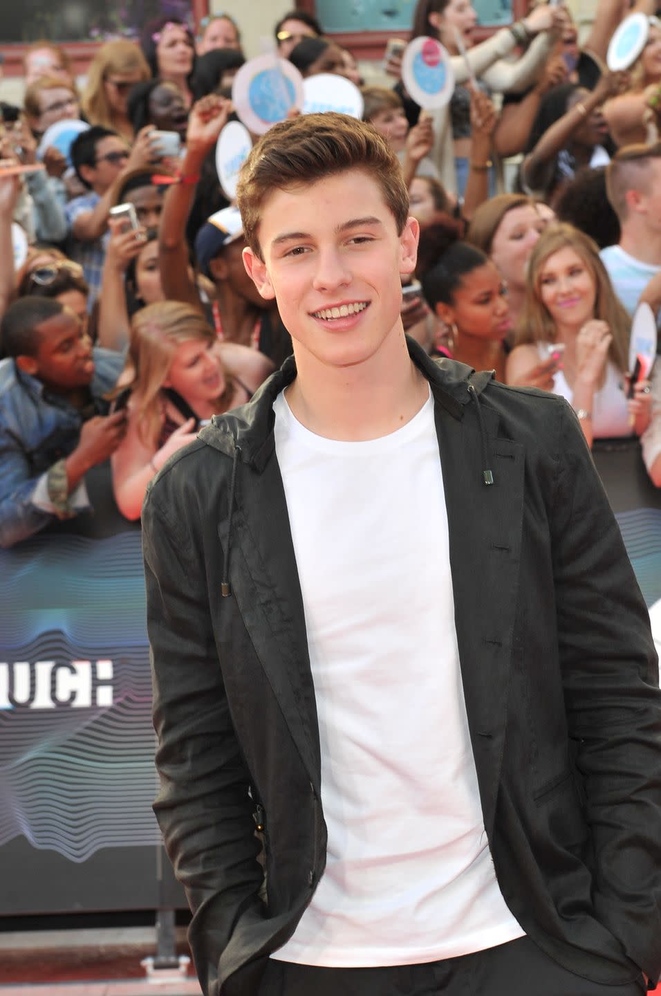 <p>Shawn Mendes got an interesting start in the music world: He began covering songs on YouTube, then showed off his talents on the app, Vine, in 2013, where he gained such a big following that he got signed with a record label. He released his first single in 2014, and became the youngest artist to debut on the top 25 for <em>Billboard's</em> Hot 100. </p>